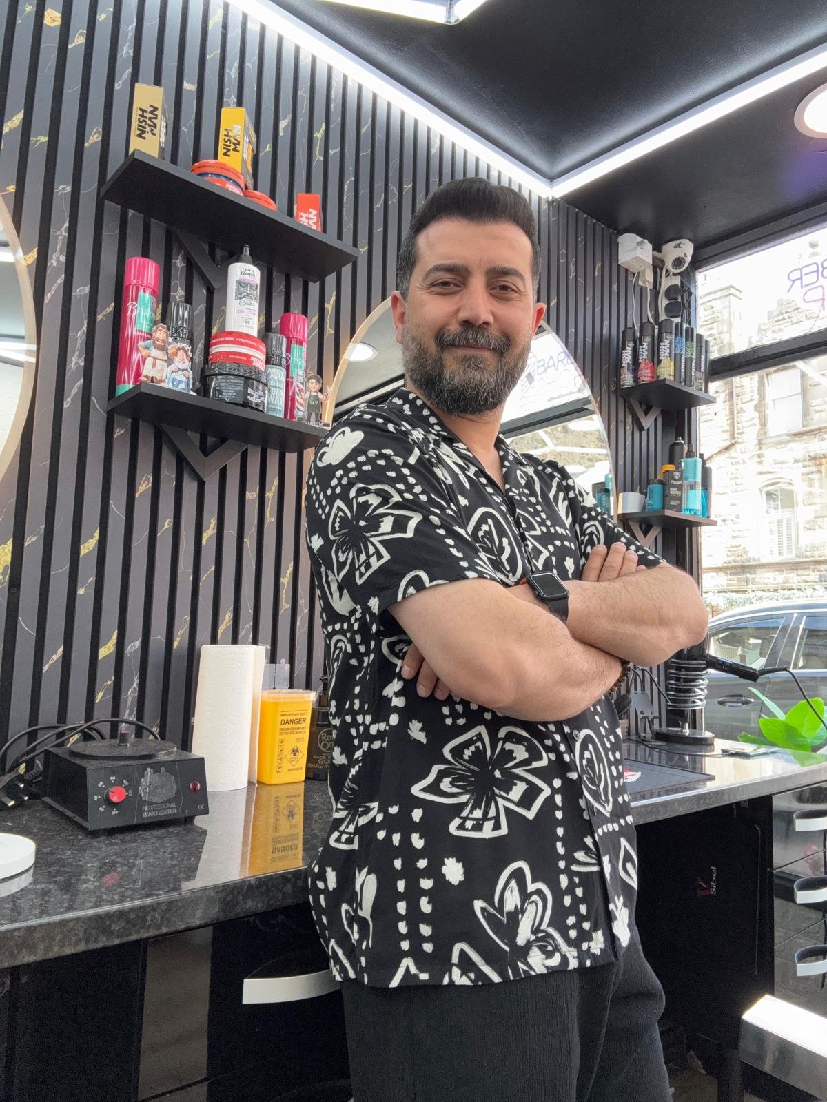 Mehmet, owner and hairdresser at Red Hair Salon